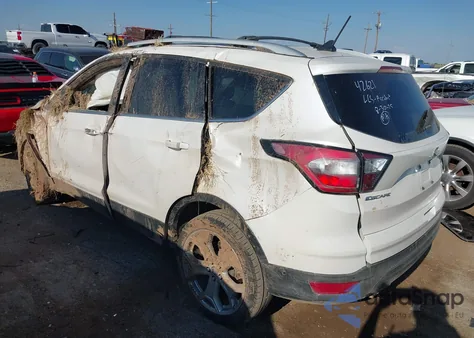 2018 Ford Escape Titanium z USA, uszkodzony, nr VIN 1FMCU0J95JUA71473